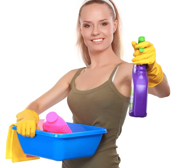 Cheerful woman is cleaning something with wisp and spray attentively. — Stock Photo, Image