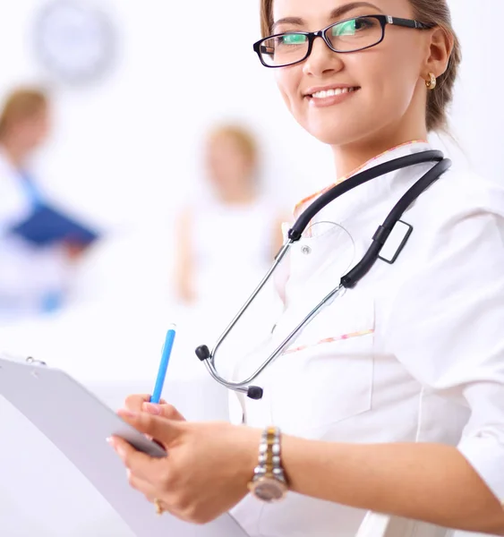 Woman doctor standing at hospital Royalty Free Stock Images