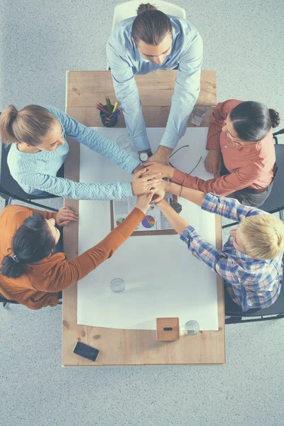 Closeup of a business colleagues with their hands stacked — Stock Photo, Image