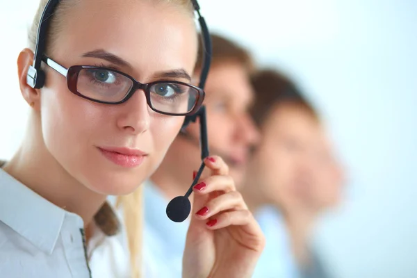 Attractive positive young businesspeople and colleagues in a call center office Stock Image
