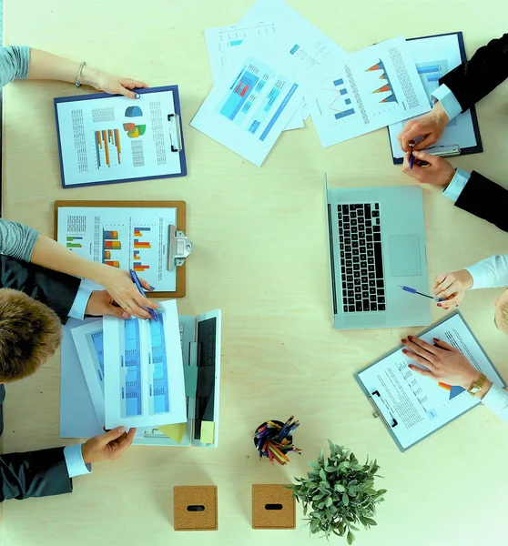 Business people sitting and discussing at meeting, in office — Stock Photo, Image