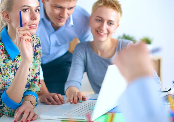 Young business people working at office on new project. — Stock Photo, Image