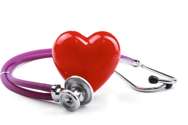 Red heart and a stethoscope on desk — Stock Photo, Image