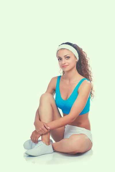 Young woman doing exercises . isolated on white background — Stock Photo, Image