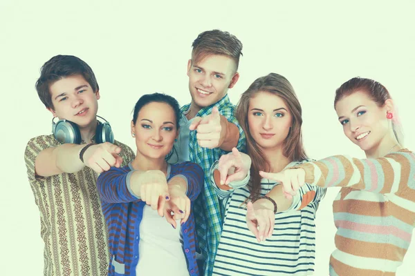 Gäng glada studenter pekar på dig. Isolerade över vit bakgrund — Stockfoto