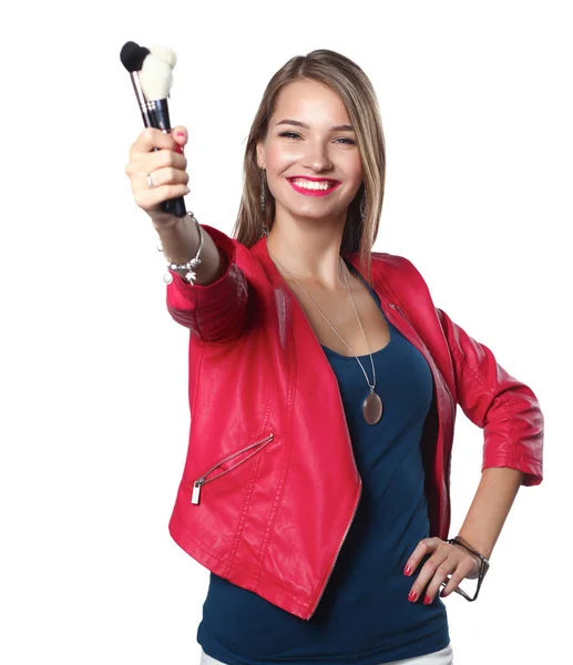 Young beautiful woman holds in hand brush for makeup — Stock Photo, Image