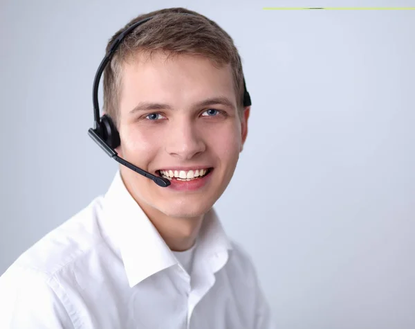 Customer support operator with a headset on white background — Stock Photo, Image