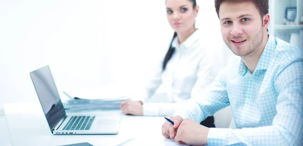 Business people sitting and discussing at meeting, in office — Stock Photo, Image