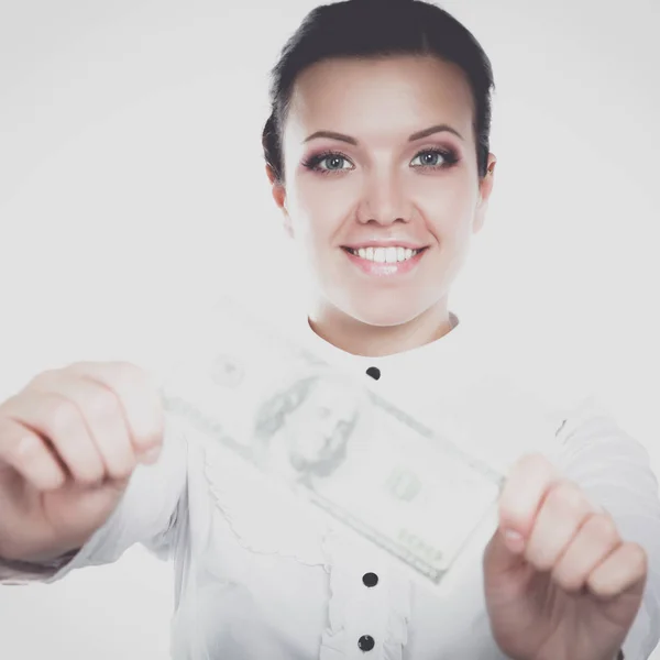 Молодая женщина с долларами в руках, изолированные на белом фоне — стоковое фото
