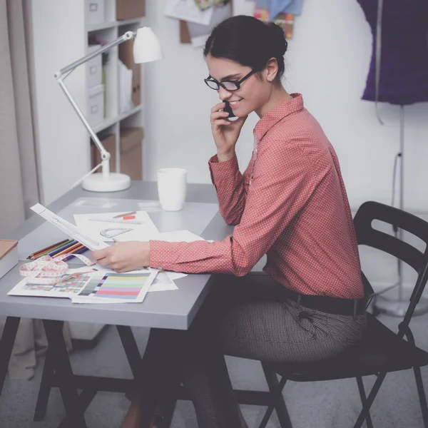 Young fashion designer working at studio. — Stock Photo, Image