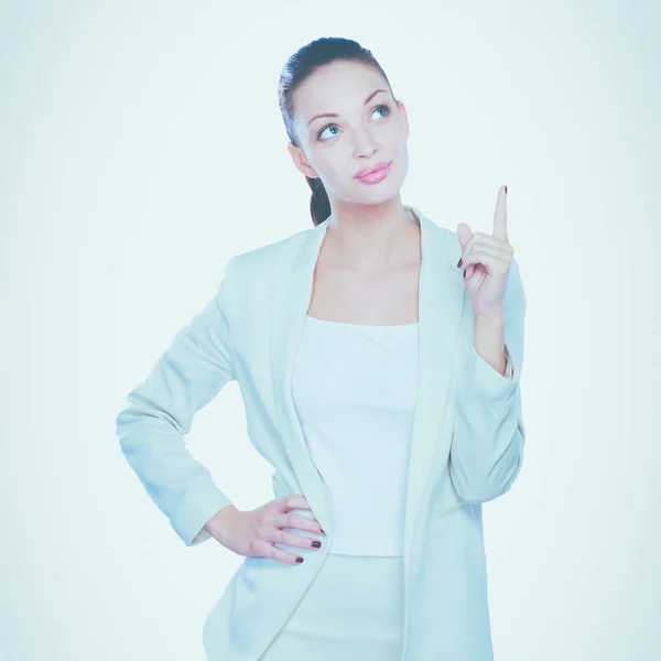 Jeune femme debout sur fond blanc — Photo