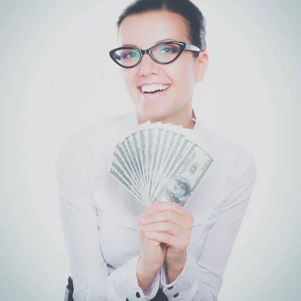 Une jeune femme avec des dollars dans les mains, isolée sur fond blanc — Photo