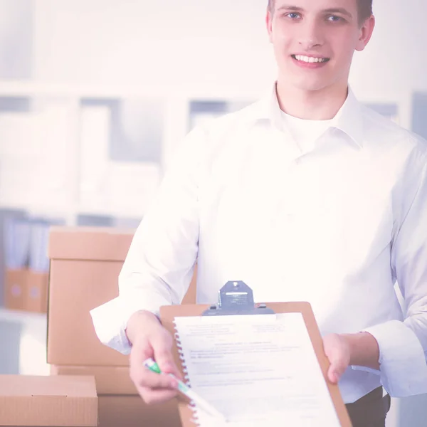 Young businessman working in office, sitting near desk — Stock Photo, Image