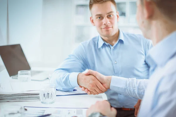 Business people sitting and discussing at meeting, in office — Stock Photo, Image