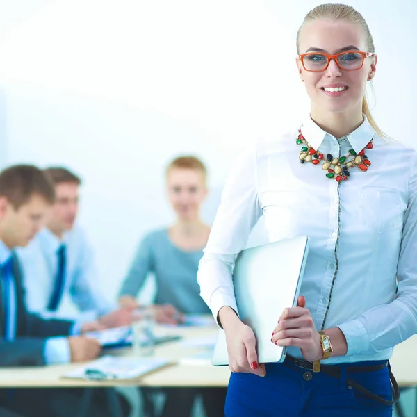 Portrait of a young woman working at office standing — Stock Photo, Image