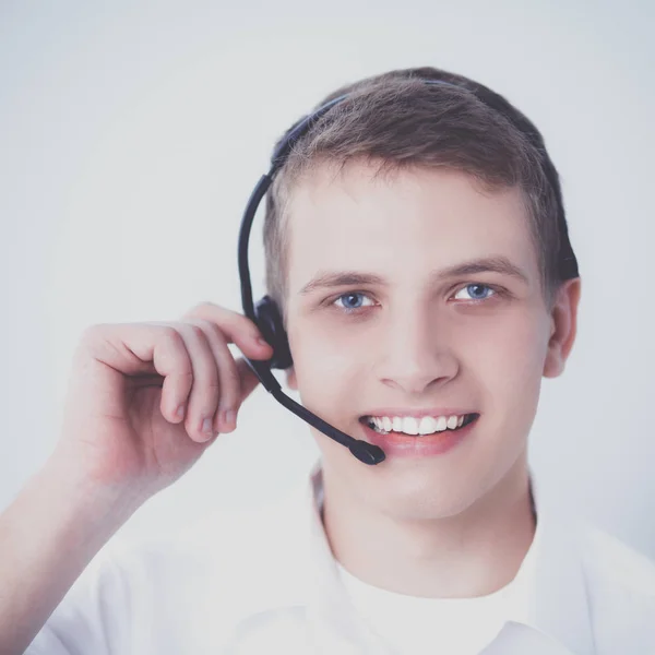 Kundsupport operatören med ett headset på vit bakgrund — Stockfoto