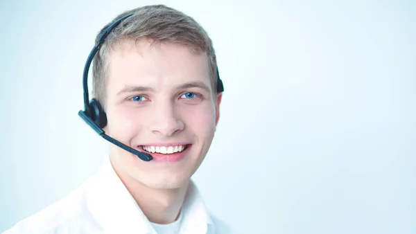 Operador de atención al cliente con auriculares sobre fondo blanco — Foto de Stock