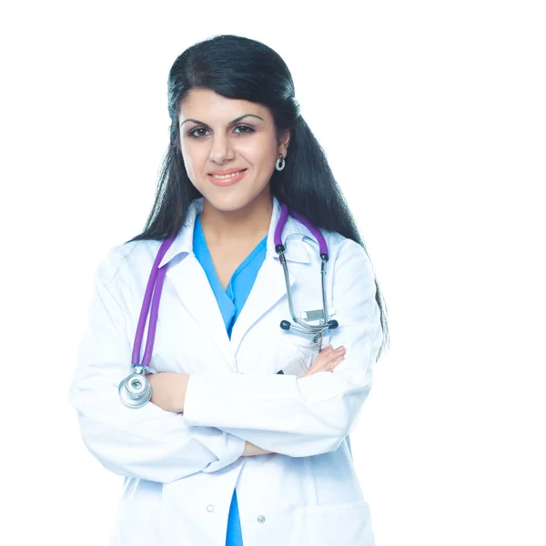 Lekarz kobieta ze stetoskopem stojąca w pobliżu ściany — Zdjęcie stockowe