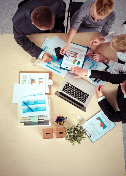 Business people sitting and discussing at business meeting, in office — Stock Photo, Image