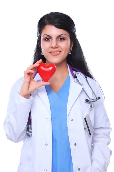 Genç kadın kalp tutan stetoskop ile doktor. — Stok fotoğraf
