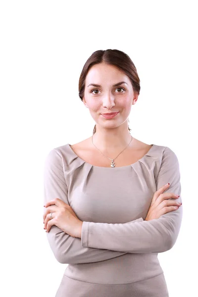 Mujer joven de pie, aislada sobre fondo blanco — Foto de Stock