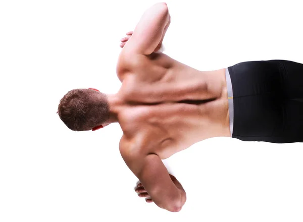 Hombre de fitness haciendo flexiones en el suelo —  Fotos de Stock