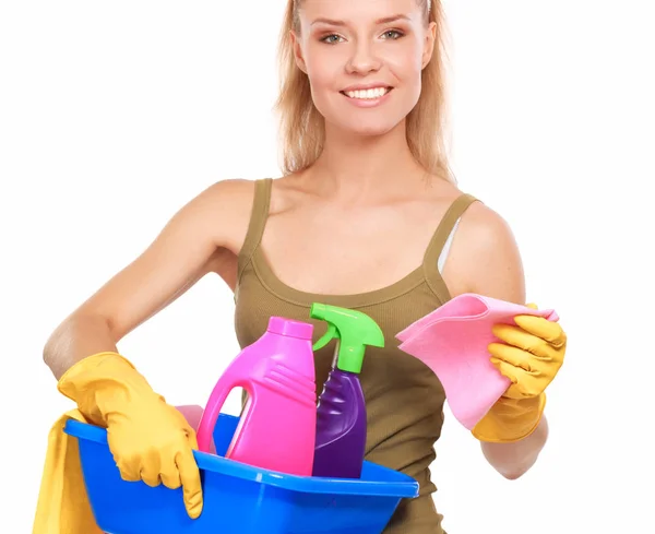 Mulher alegre está limpando algo com wisp e spray atentamente. — Fotografia de Stock