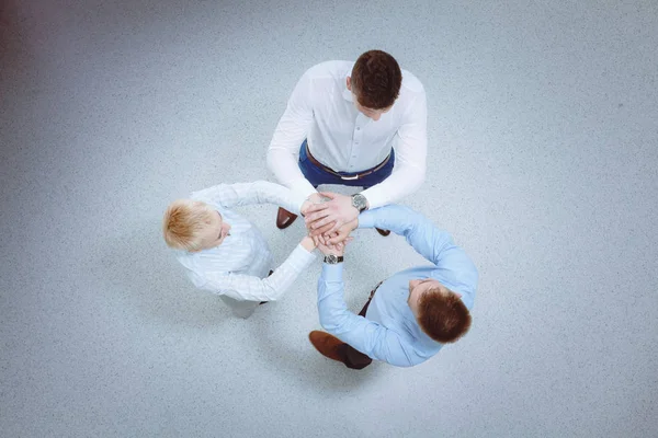 Empresários apertando as mãos - topview  . — Fotografia de Stock