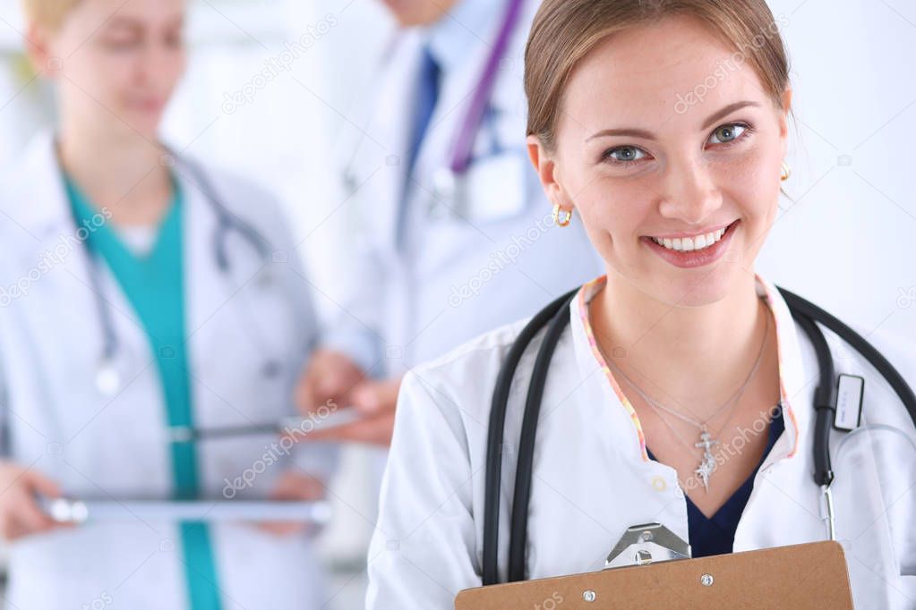 Woman doctor standing with stethoscope at hospital . Woman doctor