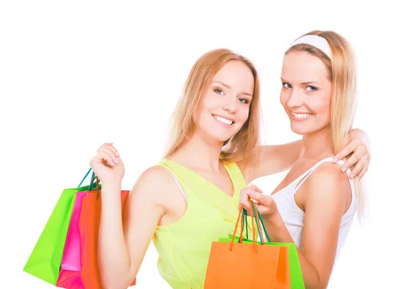 Due giovani donne in piedi con shopping bag — Foto Stock