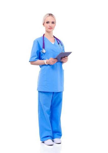 Female doctor using a digital tablet and standing on white background. Woman doctors.