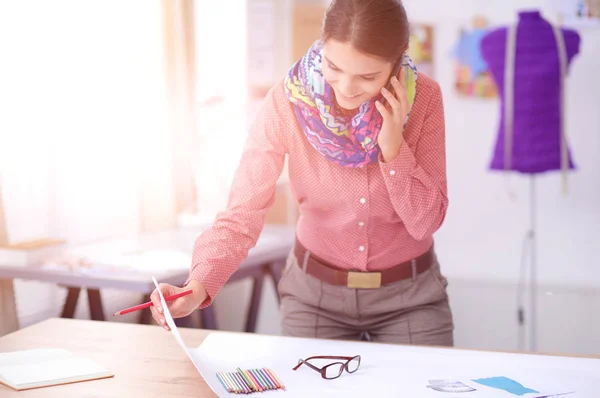 Young fashion designer working at studio. — Stock Photo, Image