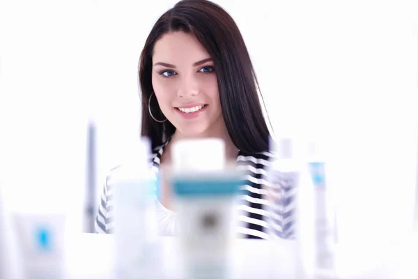 Beautiful young woman in shop — Stock Photo, Image