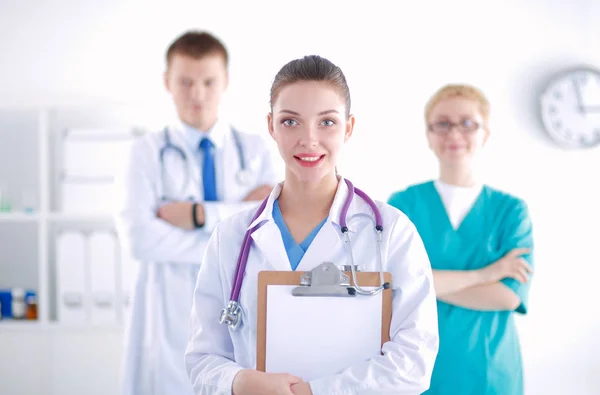 Woman doctor standing with folder at hospital. Woman doctor — Stock Photo, Image