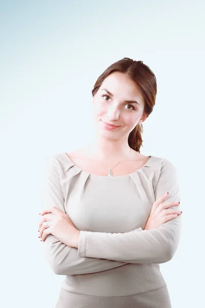 Junge schöne Frau steht auf weißem Background — Stockfoto