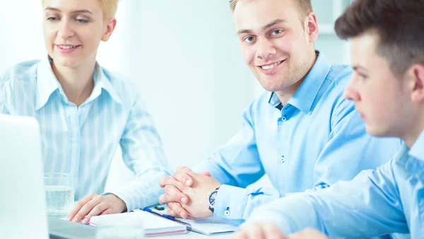 Business people sitting and discussing at business meeting, in office — Stock Photo, Image