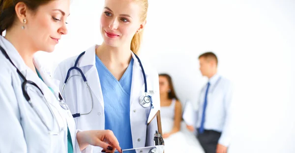 Young woman doctor holding a tablet pc — Stock Photo, Image