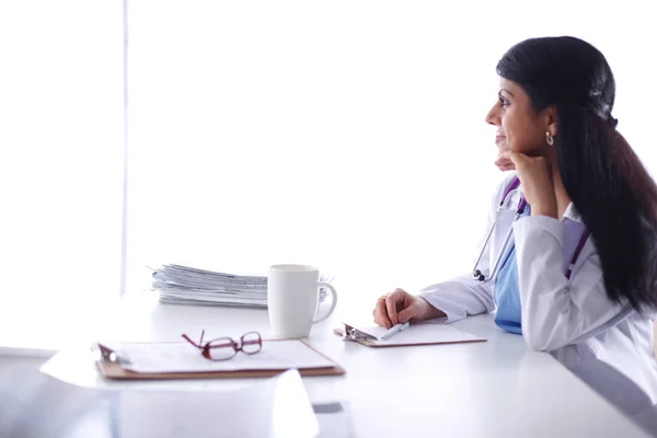 Woman with documents sitting on the desk — Stock Photo, Image