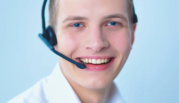 Customer support operator with a headset on white background — Stock Photo, Image