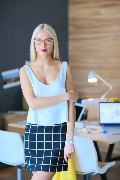 Portrait of an executive professional mature businesswoman sitting on office — Stock Photo, Image