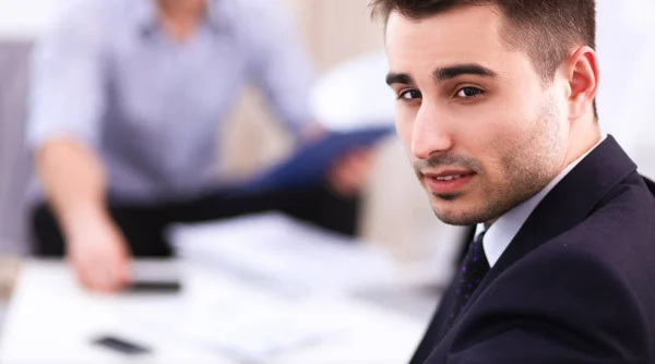 Business people sitting and discussing at business meeting, in office — Stock Photo, Image