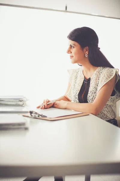Woman with documents sitting on the desk — Stock Photo, Image