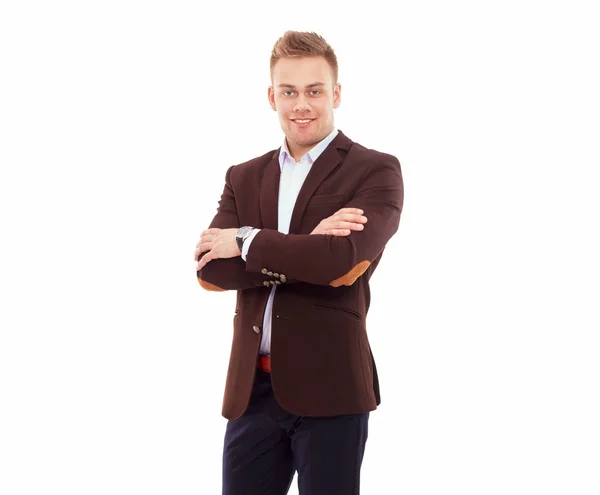 Retrato de um jovem empresário bem sucedido em pé isolado sobre fundo cinzento — Fotografia de Stock