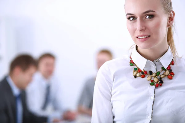 Portrait of a young woman working at office standing with folder . Portrait of a young woman. Business woman — Stock Photo, Image