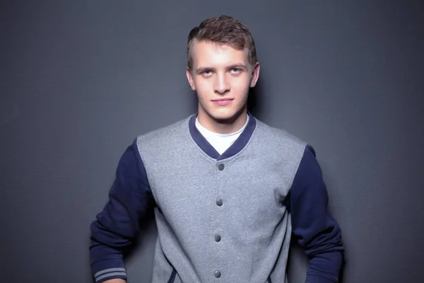 Portrait of a young man on black background.portrait of a young man. — Stock Photo, Image