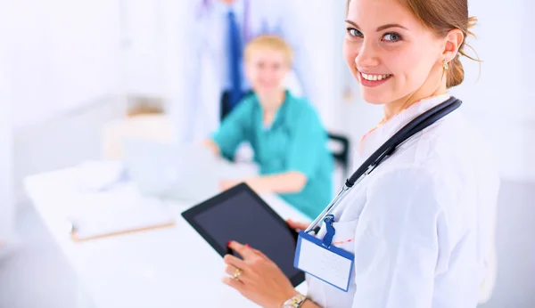 Young woman  doctor holding a tablet pc — Stock Photo, Image