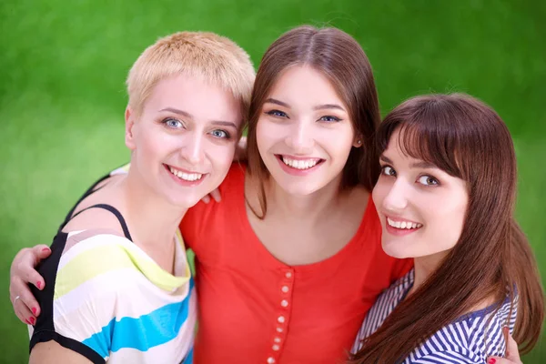 Portrait of three young women, standing together — Stock Photo, Image