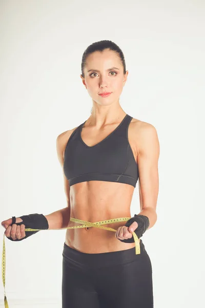 Fitness nők gyönyörű test mérőszalaggal — Stock Fotó