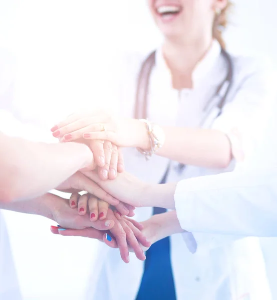 Doctors and nurses in a medical team stacking hands — Stock Photo, Image