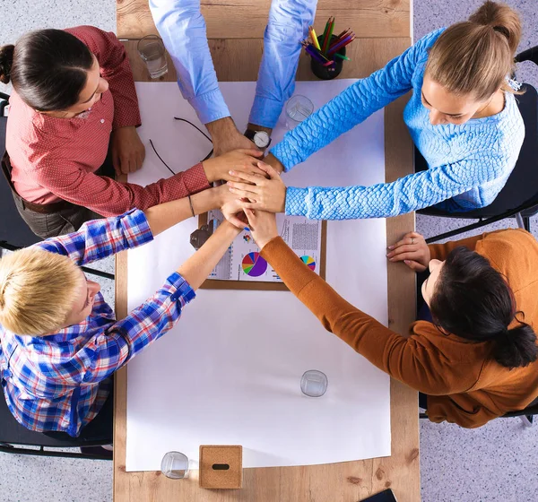 Business team with hands together - teamwork concepts — Stock Photo, Image